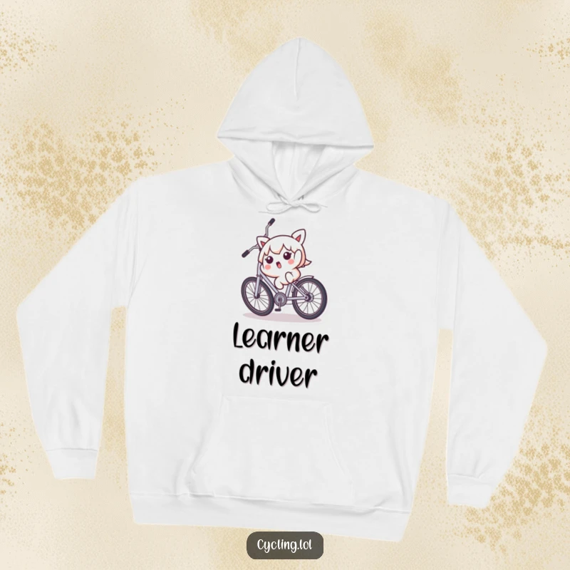 Funny hoodie showing a surprised Kawaii character falling backward off a wobbly bicycle, a humorous depiction of a minor mishap.