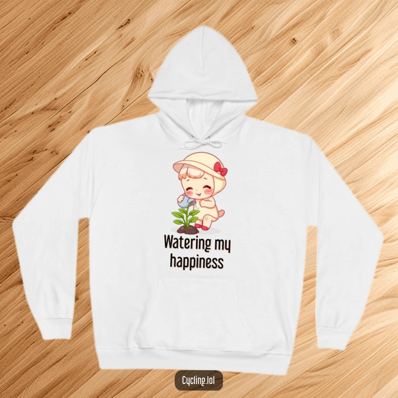 Funny hoodie featuring a character watering a plant that giggles with delight as it grows, perfect for plant parents.