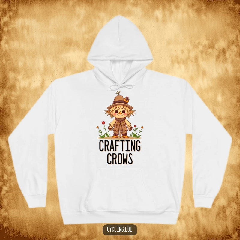 Funny hoodie featuring a character happily constructing a miniature scarecrow, perfect for casual wear and craft enthusiasts.