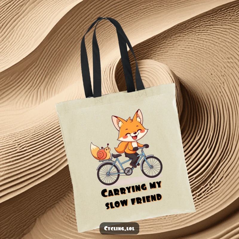 Funny tote bag with a grinning fox and snail pedaling a tandem bike, perfect for carrying items with humorous friendship.